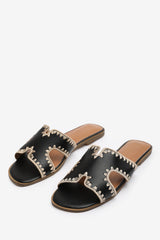 NYOMI CUT OUT STRAP FLAT SANDALS WITH STITCHING DETAIL IN BLACK FAUX LEATHER