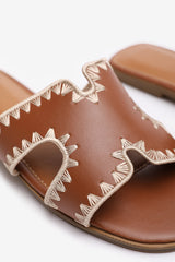 NYOMI CUT OUT STRAP FLAT SANDALS WITH STITCHING DETAIL IN TAN FAUX LEATHER