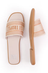 CANDOUR TEXTILE STRAP SLIP ON SANDALS IN CREAM FAUX LEATHER