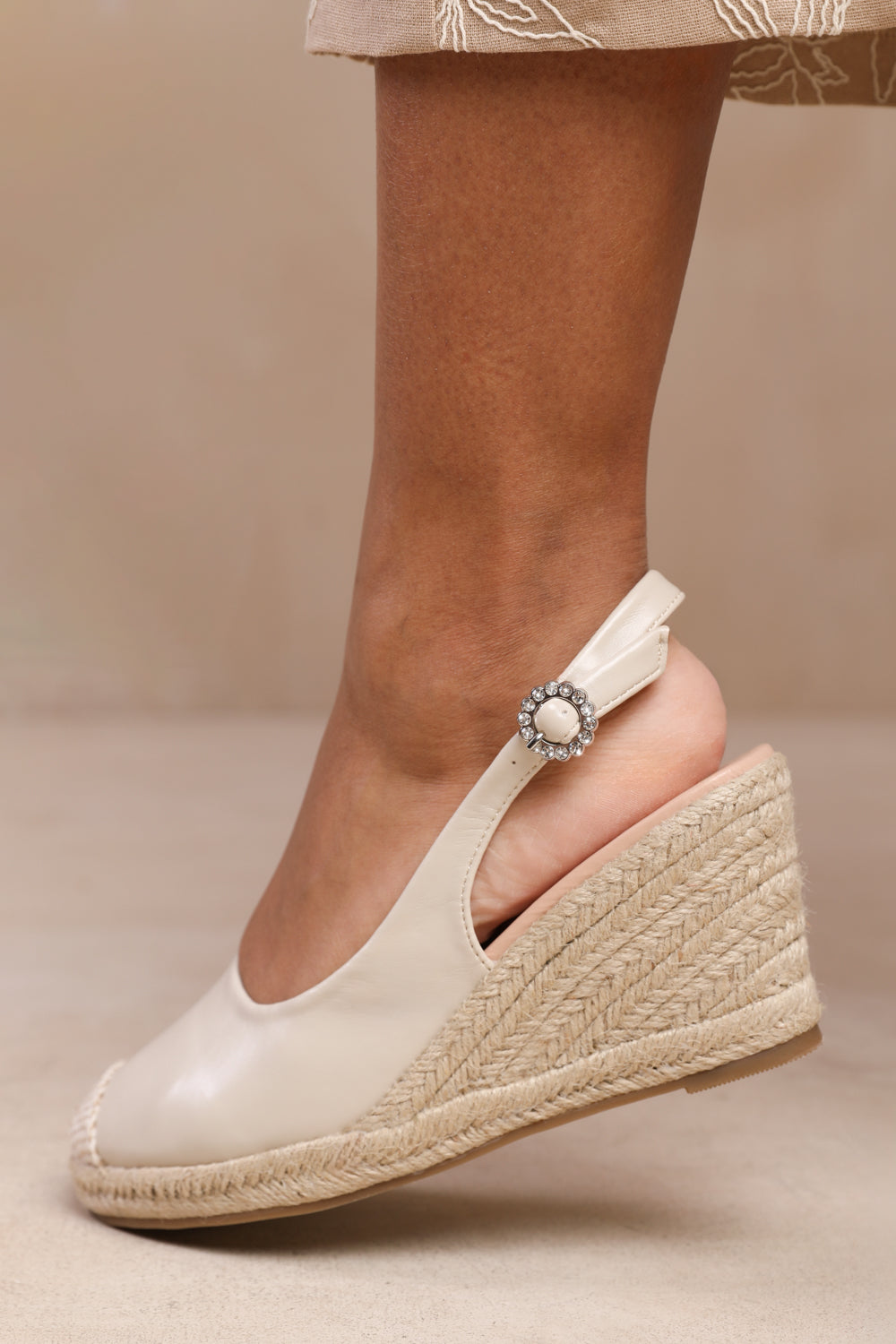 NEVADA SLINGBACK WITH DIAMANTE FLOWER BUCKLE ESPADRILLE WEDGES IN NUDE FAUX LEATHER