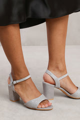 PAITYN BUCKLE UP LOW BLOCK HEEL SANDAL IN MOON SILVER GLITTER