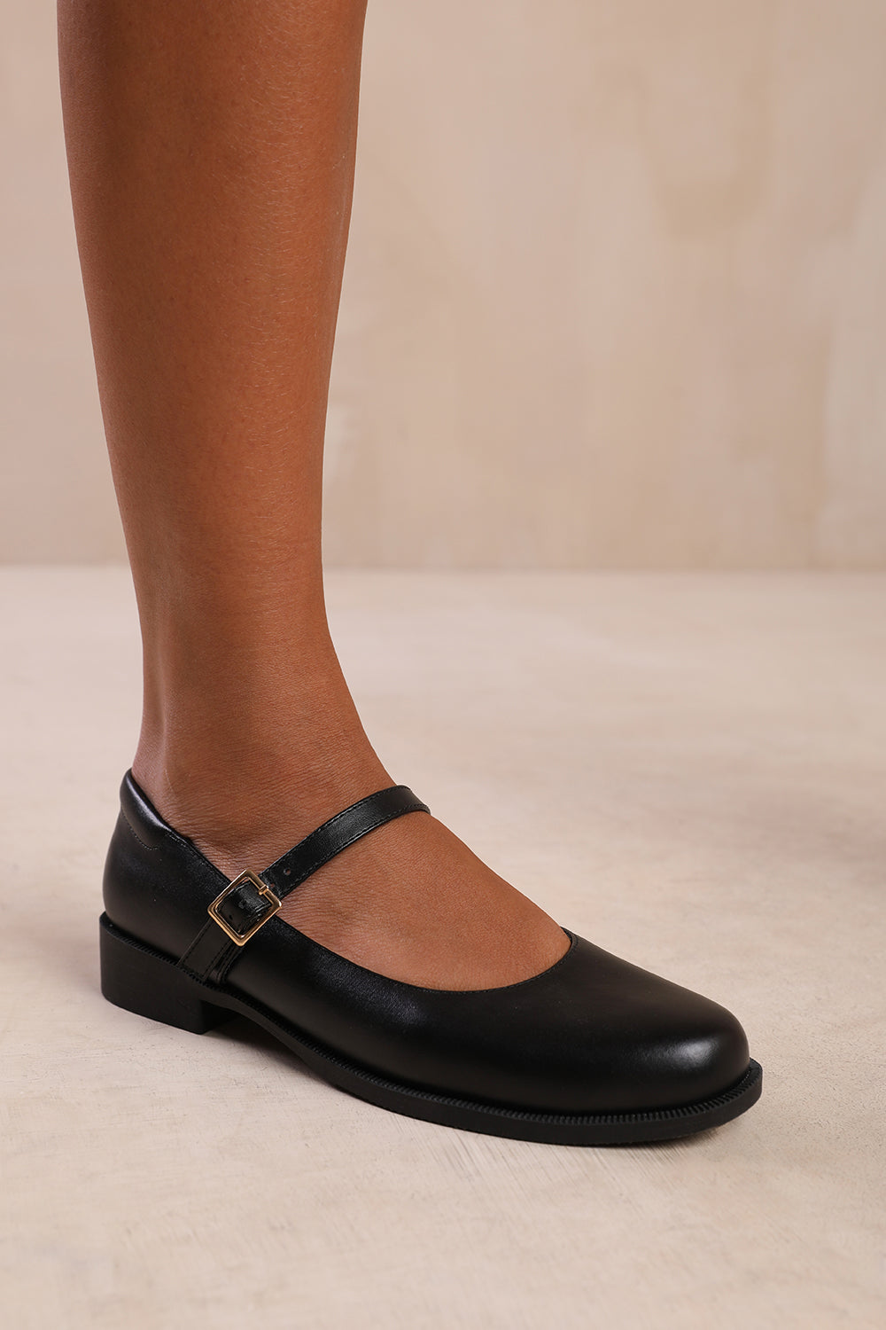 KINGSTON EXTRA WIDE FIT LOW HEEL LOAFER WITH STRAP AND BUCKLE DETAIL IN BLACK FAUX LEATHER