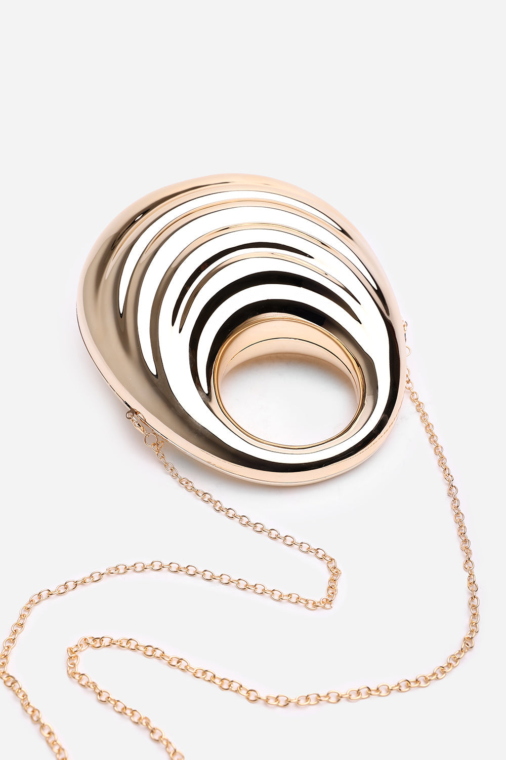 Lagoon Chrome Effect Sculpted Oval Handle Clutch In Gold
