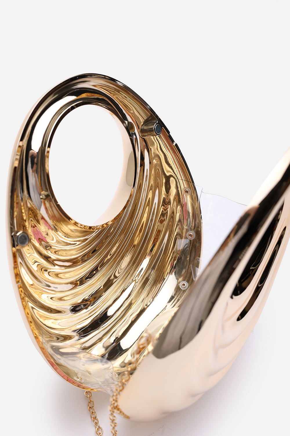 Lagoon Chrome Effect Sculpted Oval Handle Clutch In Gold