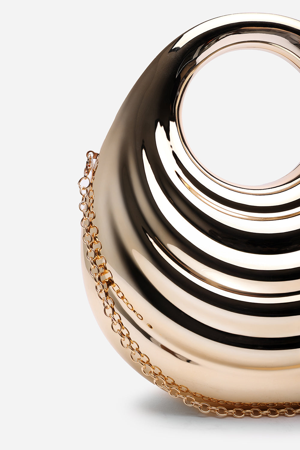 Lagoon Chrome Effect Sculpted Oval Handle Clutch In Gold