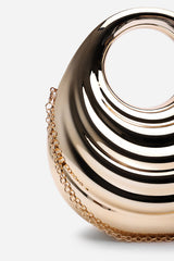 Lagoon Chrome Effect Sculpted Oval Handle Clutch In Gold