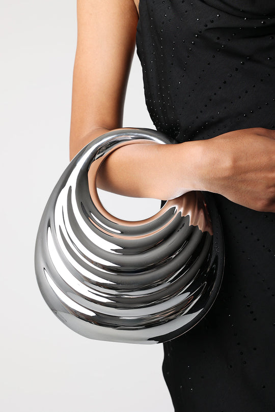 Lagoon Chrome Effect Sculpted Oval Handle Clutch In Silver