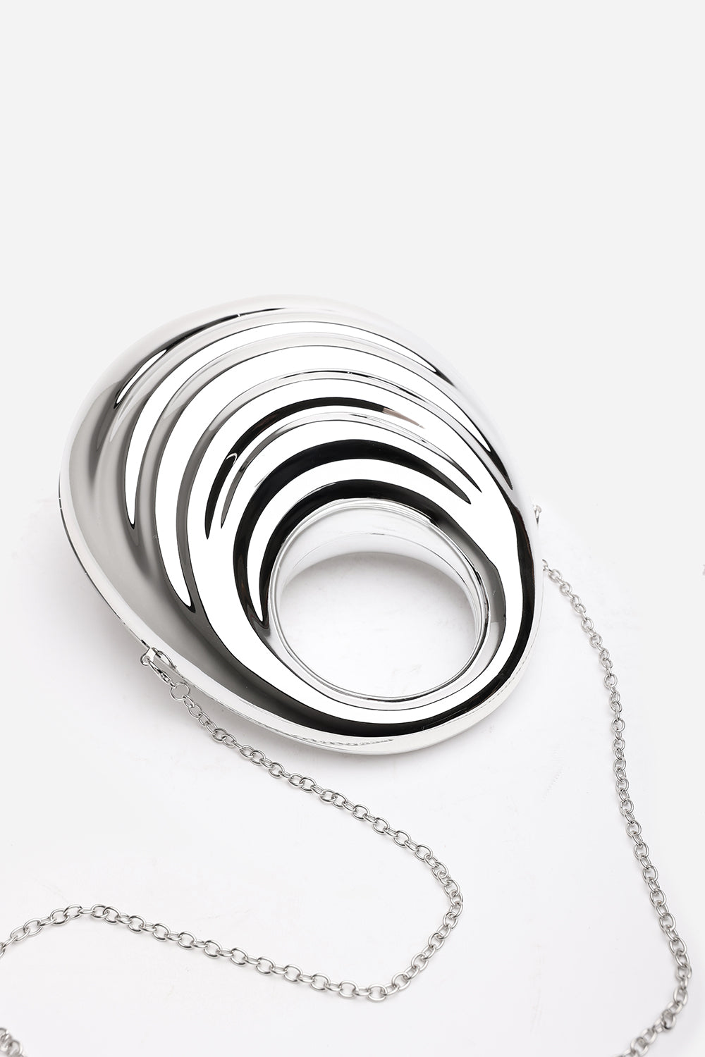 Lagoon Chrome Effect Sculpted Oval Handle Clutch In Silver