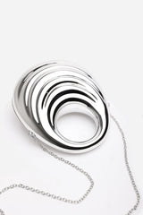 Lagoon Chrome Effect Sculpted Oval Handle Clutch In Silver