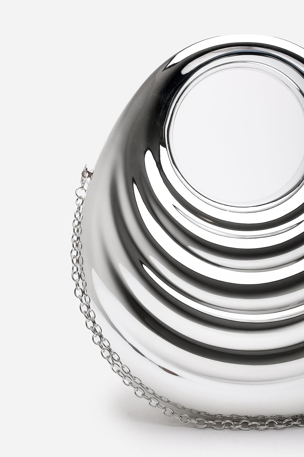 Lagoon Chrome Effect Sculpted Oval Handle Clutch In Silver