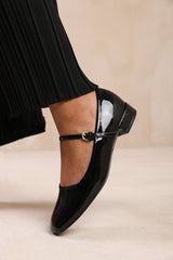 MINSK WIDE FIT LOW HEEL WITH STRAP AND BUCKLE DETAIL IN BLACK PATENT