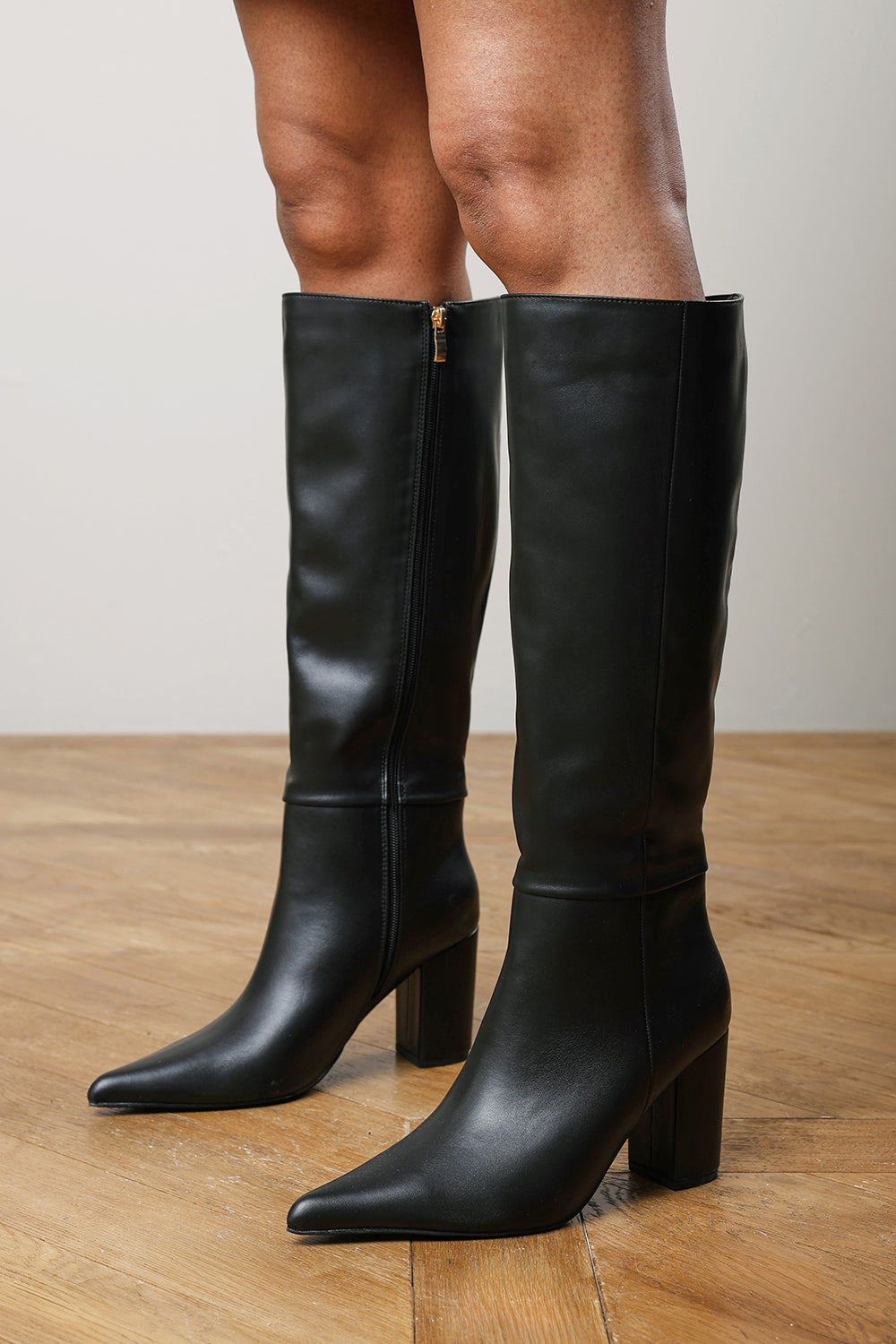 Evixa Knee High Pointed Toe Block Heel Boot