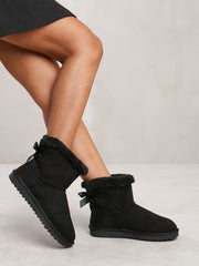 ALBA ANKLE BOOT WITH FAUX FUR LINING AND BOW RIBBON DETAIL IN BLACK