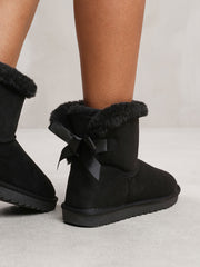 ALBA ANKLE BOOT WITH FAUX FUR LINING AND BOW RIBBON DETAIL IN BLACK