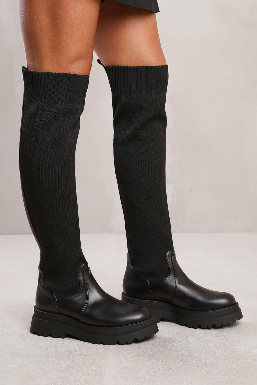 CLEO KNEE HIGH KNITTED SOCK BOOT IN BLACK