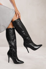 REMI HIGH HEEL CALF BOOT IN BLACK CROCO PATENT