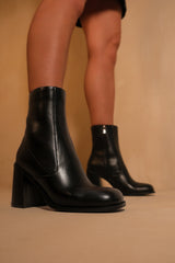 KEISHA BLOCK HEEL MID CALF BOOTS WITH SIDE ZIP IN BLACK FAUX LEATHER