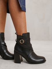 AISLINN BLOCK HEEL ANKLE BOOTS WITH ZIP AND BUCKLE DETAIL IN BLACK FAUX LEATHER