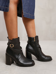 AISLINN BLOCK HEEL ANKLE BOOTS WITH ZIP AND BUCKLE DETAIL IN BLACK FAUX LEATHER