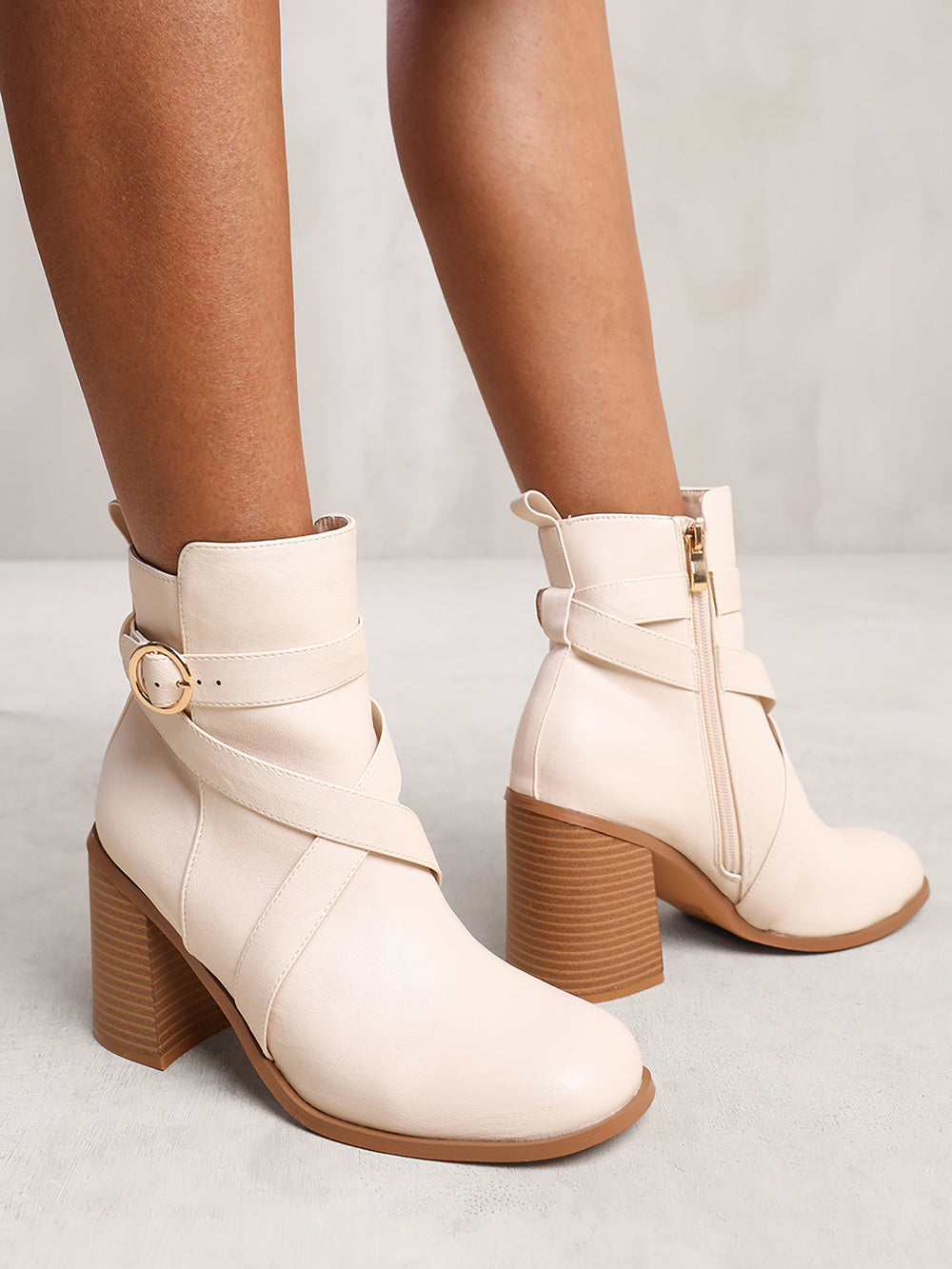 AISLINN BLOCK HEEL ANKLE BOOTS WITH ZIP AND BUCKLE DETAIL IN CREAM FAUX LEATHER