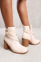 TEAGAN ANKLE BOOT WITH CHUNKY HEEL AND CROSS OVER STRAP DETAIL IN CREAM FAUX LEATHER