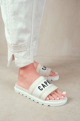 MOON FLAT SANDAL WITH TEXT DETAILING AND PRINTED SOLE IN CREAM