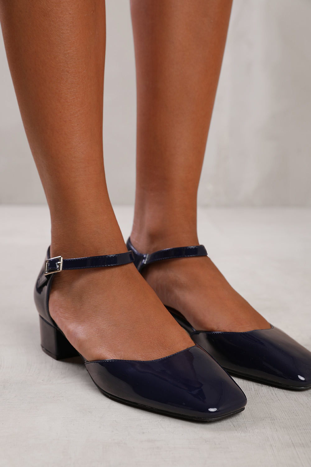 SINGAPORE WIDE FIT SQUARE TOE LOW BLOCK HEEL WITH STRAP IN NAVY PATENT