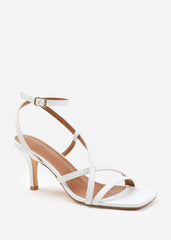 AINSLEY MULTI STRAP CROSS OVER MID HEELS IN WHITE FAUX LEATHER