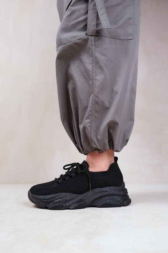 WHISPER CHUNKY SOLE KNIT TRAINERS WITH CRYSTAL EMBELLISHMENT IN BLACK