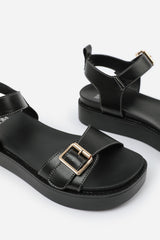 ISABEL WIDE FIT DOUBLE BUCKLE STRAP PLATFORM SANDALS IN BLACK FAUX LEATHER