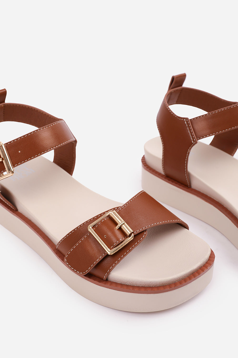 ISABEL DOUBLE BUCKLE STRAP PLATFORM SANDALS IN TAN FAUX LEATHER