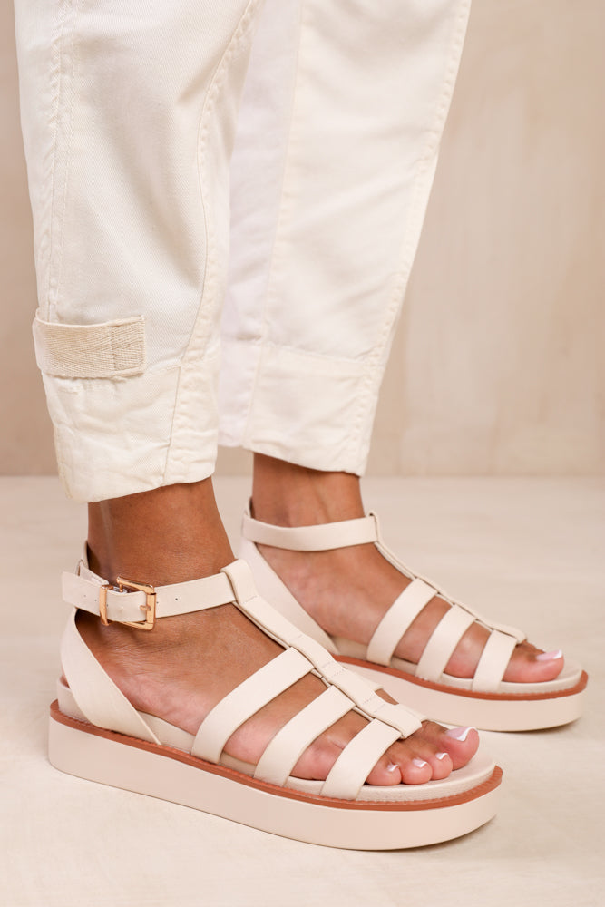 DUBAI WIDE FIT MID PLATFORM GLADIATOR STRAP IN CREAM PU