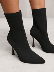 NELLOFER KNITTED HIGH HEEL ANKLE SOCK BOOTS WITH POINTED TOE IN BLACK