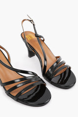 MYKONOS MUTLI STRAP SLINGBACK LOW BLOCK HEEL IN BLACK PATENT