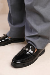 MONACO WIDE FIT SLIP ON LOAFERS WITH METAL DETAILING IN BLACK PATENT