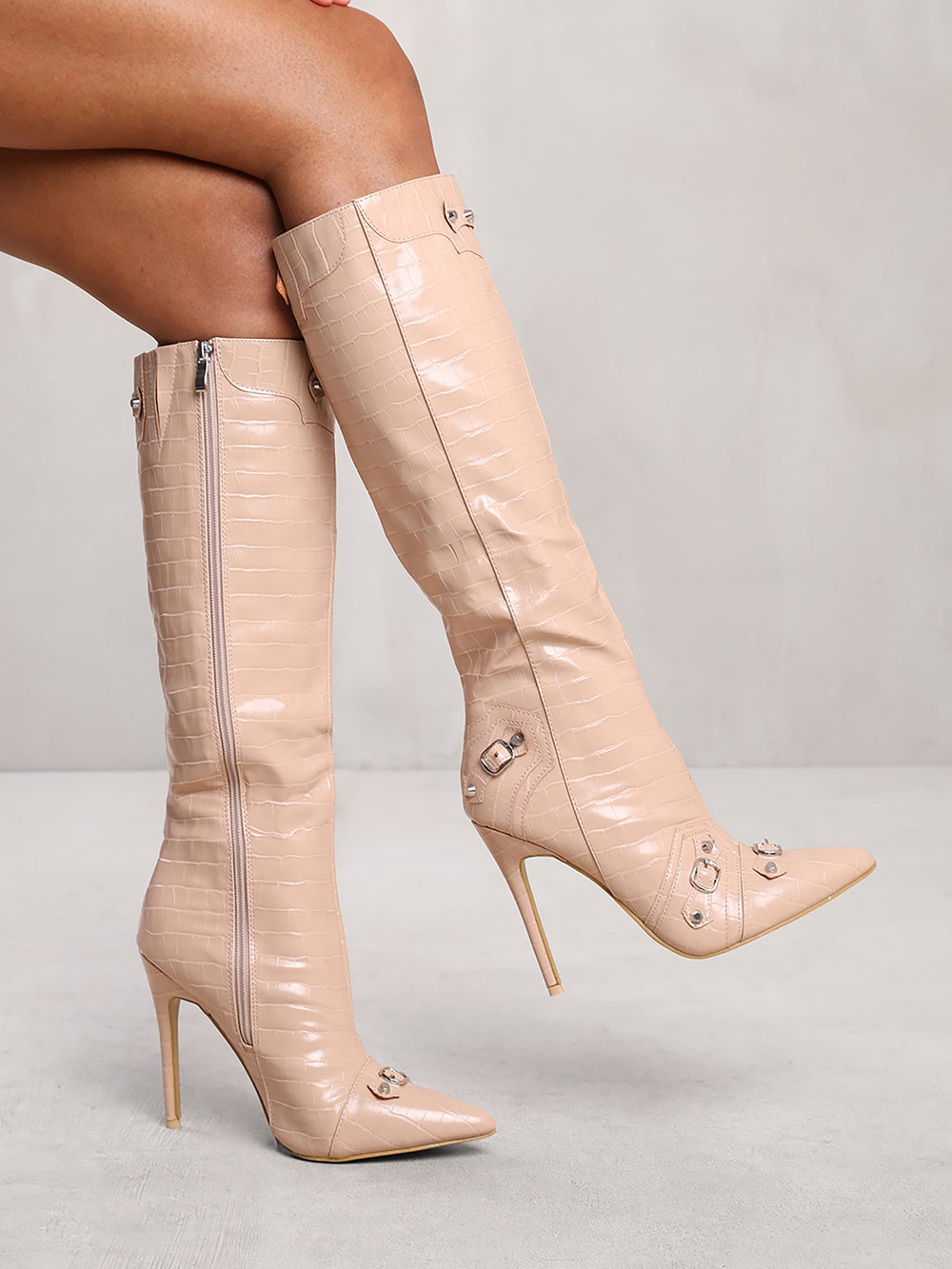 AMELIA BELOW KNEE HIGH HEEL BOOT WITH STUD AND BUCKLE DETAIL IN NUDE