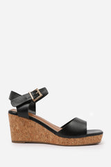 GISELLE  WIDE FIT WEDGE SANDALS WITH BUCKLE ANKLE STRAP IN BLACK GRAIN PU