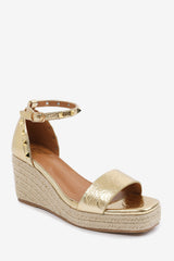 PRESLEY WEDGE SANDALS WITH GLADIATOR  ANKLE STRAP IN GOLD CREASE PU