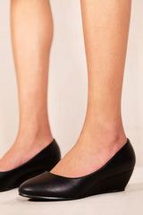 KIERAN WIDE FIT PLATFORM LOW WEDGE MID HEEL COURT SHOES IN BLACK FAUX LEATHER