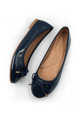 BEXLEY SLIP ON FLAT PUMPS IN NAVY PATENT FAUX LEATHER