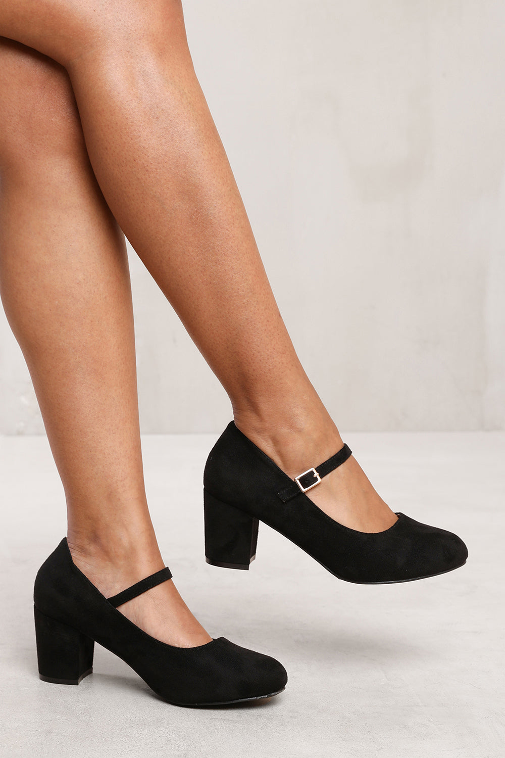 ARACELI BLOCK HEEL MARY JANE PUMPS IN BLACK FAUX SUEDE