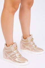 HITOP WEDGE TRAINERS WITH A FRONT LACE UP IN GOLDEN SUEDE