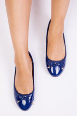 BEXLEY SLIP ON FLAT PUMPS IN NAVY PATENT FAUX LEATHER