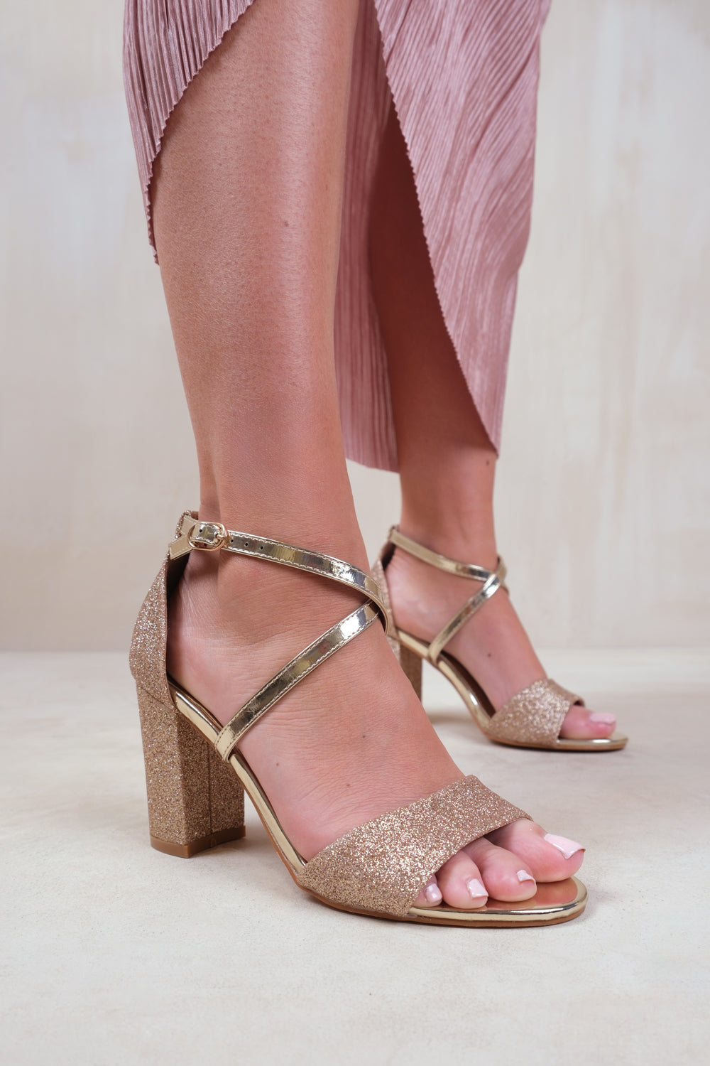RUTH MID HIGH BLOCK HEEL SANDALS WITH CROSS OVER ANKLE STRAP IN GOLD
