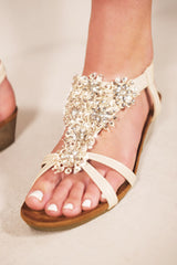 CEVEDO LOW WEDGE HEEL SANDALS WITH DIAMANTE FLOWERS DETAIL IN NUDE FAUX LEATHER