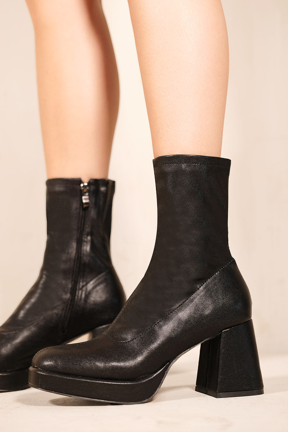 LAURIE MID FLARE BLOCK HEEL ANKLE BOOTS IN BLACK FAUX LEATHER