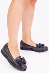 ALPHA FLAT BALLET SLIDER WITH BOW IN BLACK FAUX LEATHER