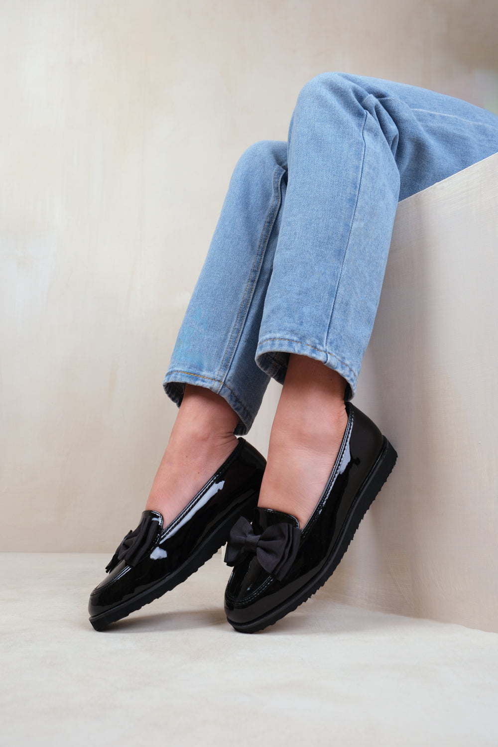 ALPHA EXTRA WIDE FIT SLIP ON LOAFER SLIDER WITH BOW DETAIL IN BLACK PATENT FAUX LEATHER