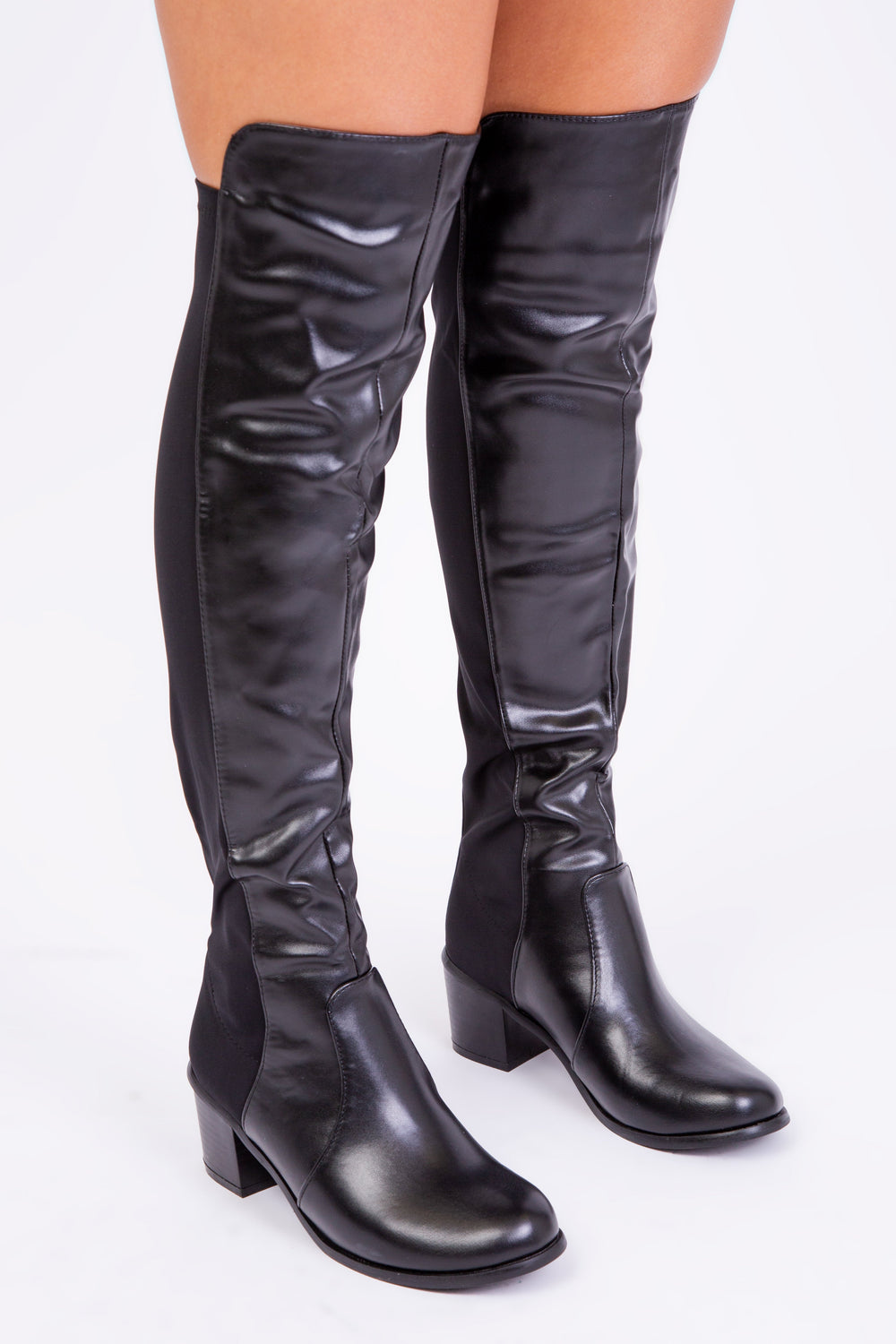 BRITTA THIGH HIGH MID HEELED BOOTS IN BLACK FAUX LEATHER