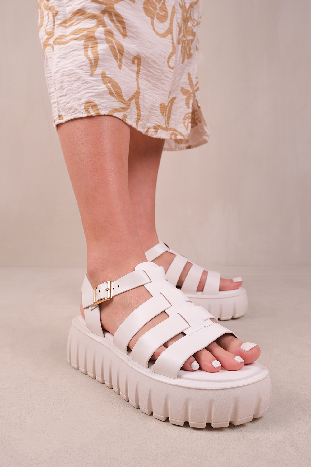 ELIXIR STRAPPY FLATFORM SANDALS IN WHITE FAUX LEATHER